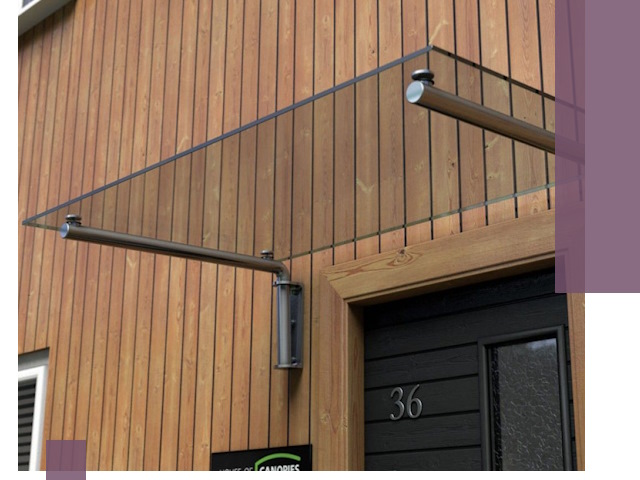 Стеклянные козырьки на входы и фасады в Костомукше